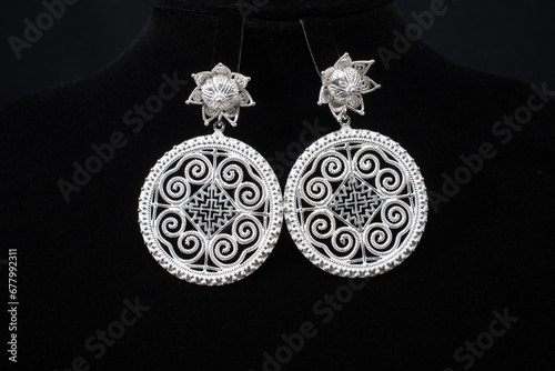 Obraz na płótnie Hmong silver jewelry on black background, Handmade silver accessories