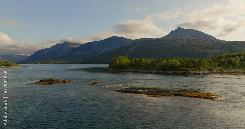 Aerial view of high tide in Efjord, Norway. Mountain vista, Norwegian fjord, lush green vegetation.