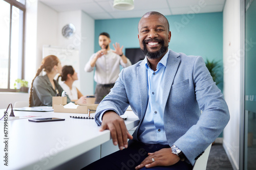 Business, meeting and portrait of happy black man for teamwork, collaboration and discussion. Corporate office, company and face of person with staff for conversation, planning and project feedback photo
