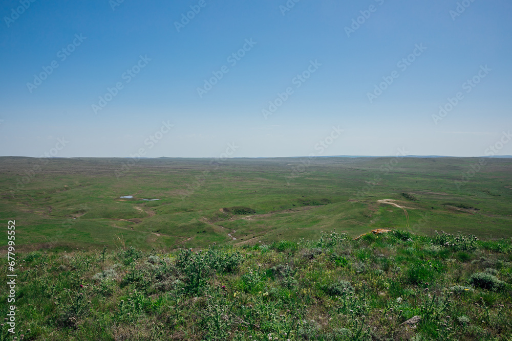 Landscape view from top of green mountain and blue sky