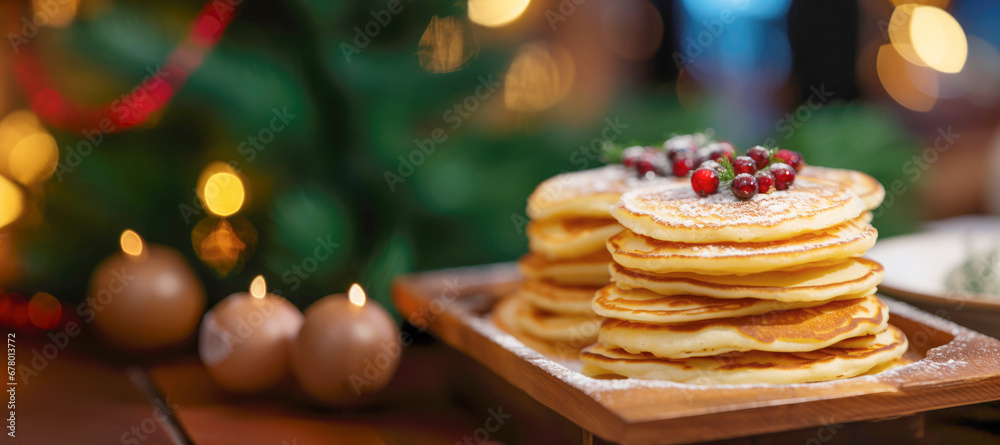 A stack of sweet, freshly made Russian pancakes, a delicious and traditional dessert, served on a plate for a special Christmas breakfast.