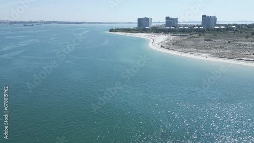 Aerial view of some hotel buildings and beach along the Sado River, Portugal. photo