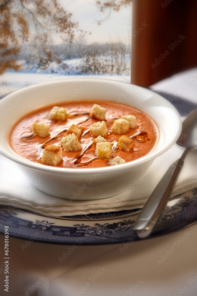 Gazpacho, traditional cold soup from the Andalusia region with tomatoes, cucumber, peppers, garlic, vinegar, olive oil and ice water Gazpacho, traditional cold soup from the Andalusia region with tomatoes, cucumber, peppers, garlic, vinegar, olive oil and ice water