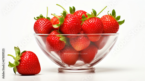 Strawberries in a glass cup isolated on white background.