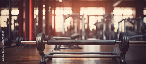 Emphasize the Bench and gym equipment in the blurred background Copy space image Place for adding text or design