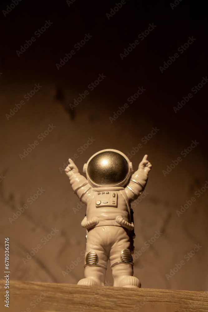 Plastic toy figure astronaut on moon concrete background Copy space. Concept of out of earth travel, private spaceman commercial flights. Space missions and Sustainability Plastic toy figure astronaut on moon concrete background Copy space. Concept of out of earth travel, private spaceman commercial flights. Space missions and Sustainability