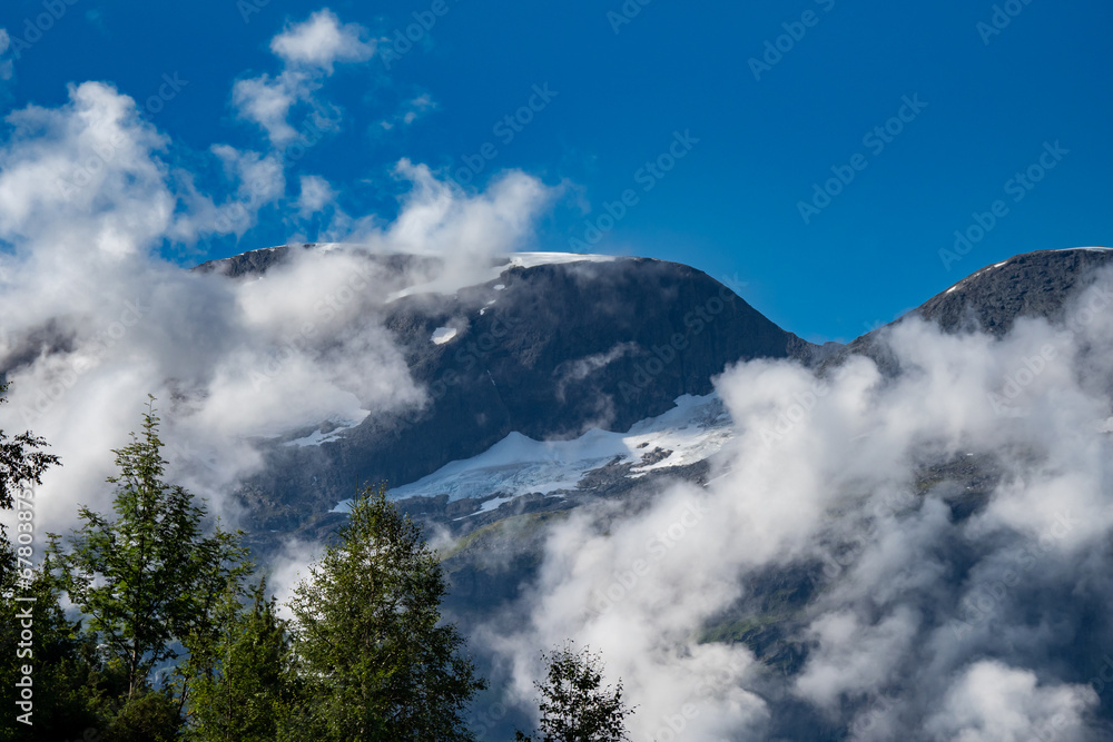 Glaciers at the summit of the Peaks in the mountains of Norway during summer - Jostedalsbreen National Park at Stryneskåla Glaciers at the summit of the Peaks in the mountains of Norway during summer - Jostedalsbreen National Park at Stryneskåla