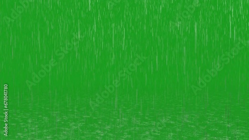 Rain falling on ground with droplet splashes on green screen background