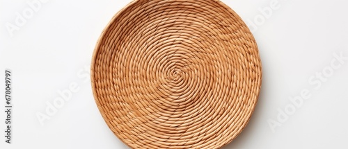 woven circular placemat on white background, top view