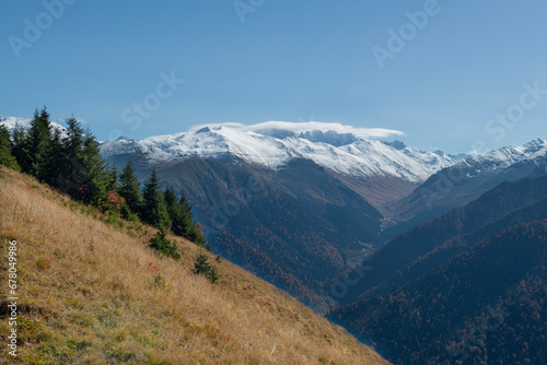 Foggy and snowy mountain landscape. Mountains covered with fog and clouds. Snow-capped hills. Snow-covered forest landscape. Black Sea mountains. Pokut Plateau. Kackar Mountains. Rize, Türkiye. © osman