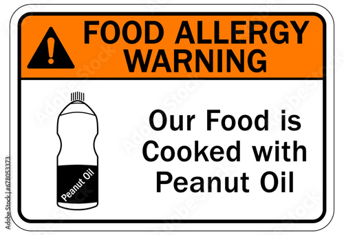 Food allergy warning sign and labels our food may contain peanut oil