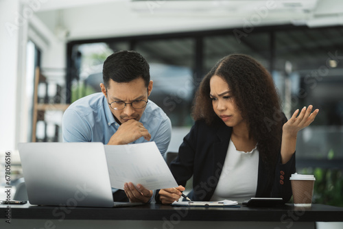 business people, teamwork, people and crisis concept - team data analysts and solving problems in the office