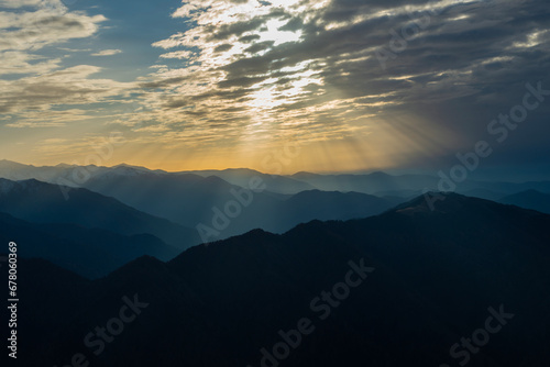 Rays of sunlight reflected from the clouds to the mountains.Rays of sunlight reflected from the clouds to the mountains. Sunset Colorful images in the mountains. View of Kackar mountains from Huser P