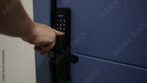 Modern door with an electronic lock to the apartment. Dial an access code to enter the room. Security from burglary and theft, close-up photo