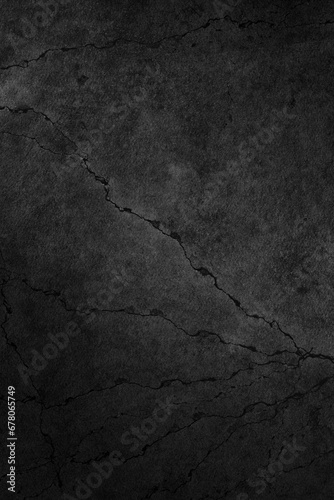 Light on black grunge background. Concrete wall texture