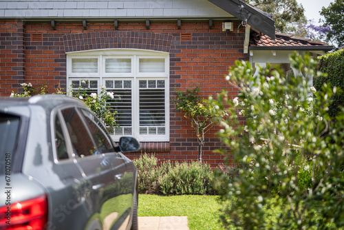 Photography grey car parked home driveway federation house cottage garden neighbourhood wind
