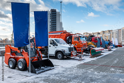 Exhibition of snow removal equipment on a clear winter day photo