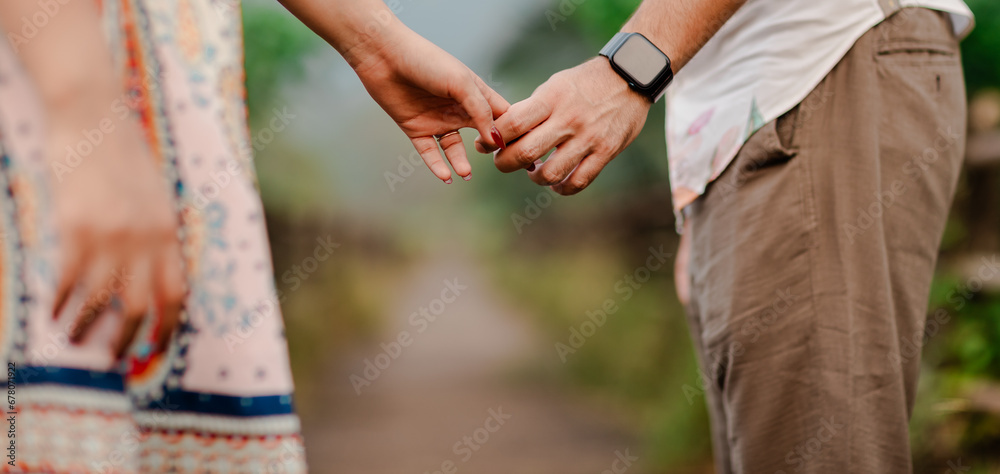couple holding hands together couple holding hands together