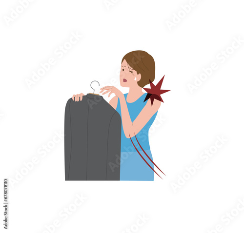  凍結肩,四十肩,五十肩,関節周囲炎で肩が痛み服が吊れない女性