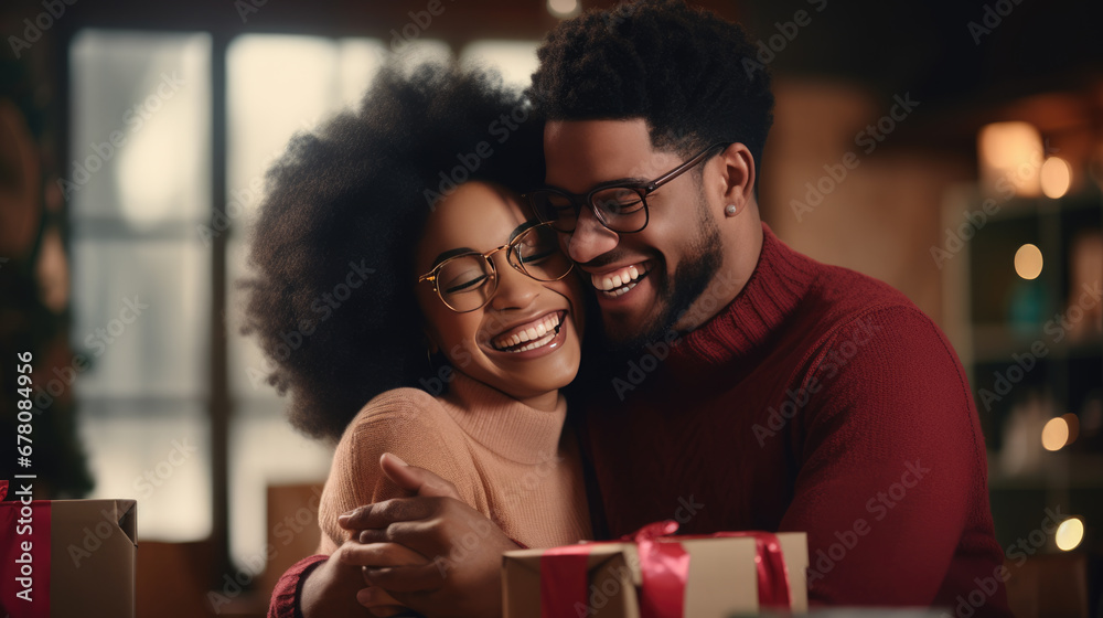 Couple in cozy sweaters, sharing a moment of joy and affection as they exchange a Christmas gift, with a festively decorated tree and warm lights in the background. Couple in cozy sweaters, sharing a moment of joy and affection as they exchange a Christmas gift, with a festively decorated tree and warm lights in the background.