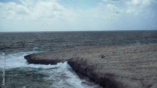 Slow Motion Of Waves Crashing Against Rocks