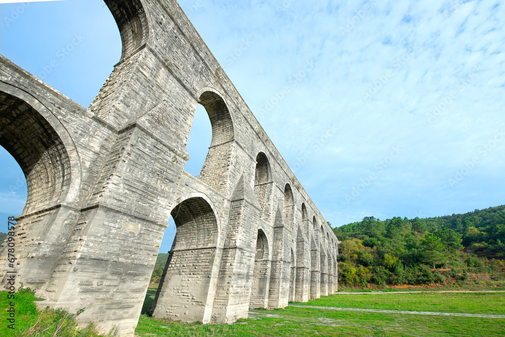Güzelce Aqueduct built in Istanbul by the Master Ottoman Architect Sinan. Güzelce Aqueduct One Element of Kırkçeşme Waterway of Great Sinan.
Güzelce Aqueduct built in Istanbul by the Master Ottoman Architect Sinan. Güzelce Aqueduct One Element of Kırkçeşme Waterway of Great Sinan.