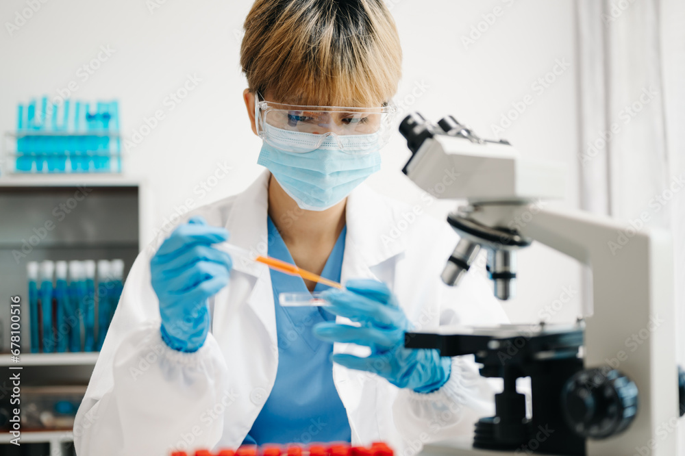 Scientist mixing chemical liquids in the chemistry lab. Researcher working in laboratory