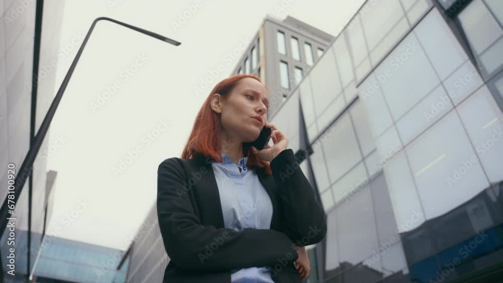 Caucasian woman employer entrepreneur serious female worried business manager businesswoman talking phone answer mobile call problem discuss deal corporate talk smartphone in city conversation remote Caucasian woman employer entrepreneur serious female worried business manager businesswoman talking phone answer mobile call problem discuss deal corporate talk smartphone in city conversation remote