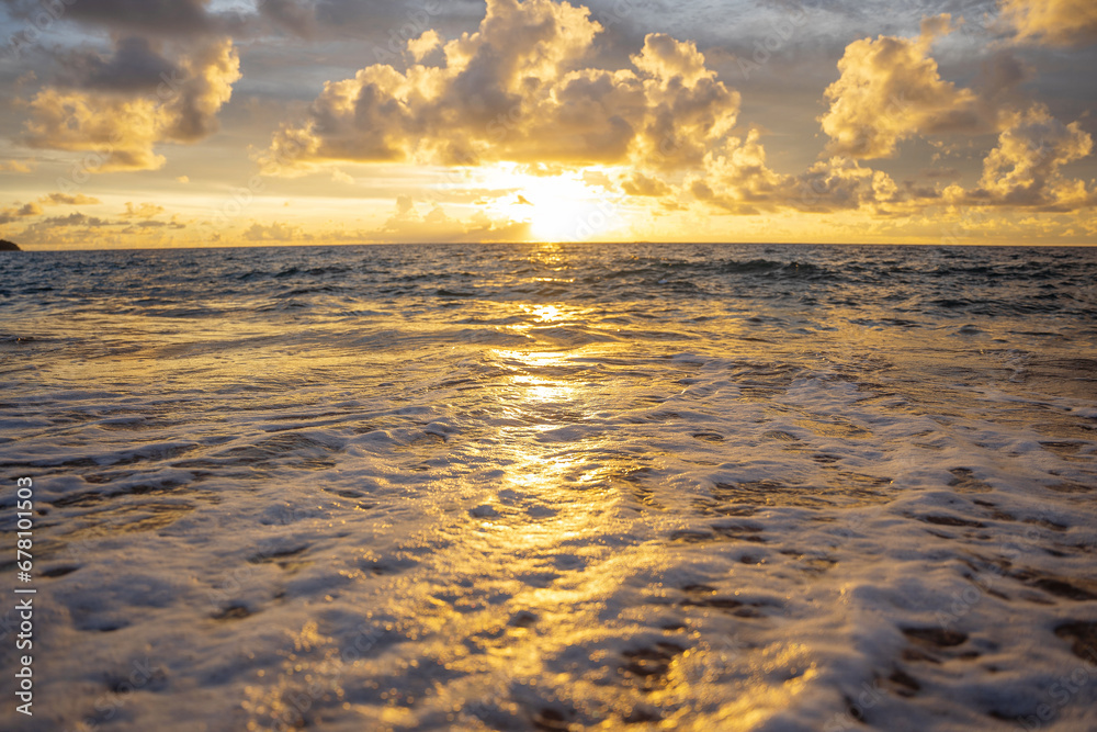 A beautiful wild beach, the waves of the clear sea roll on the white sand. evening sea. A beautiful wild beach, the waves of the clear sea roll on the white sand. evening sea.