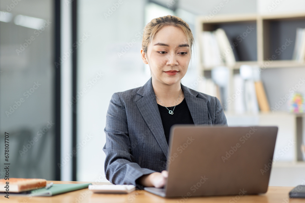 Fototapeta premium Business asian woman working at office with documents on his desk, doing planning analyzing the financial report, business plan investment, finance analysis concept