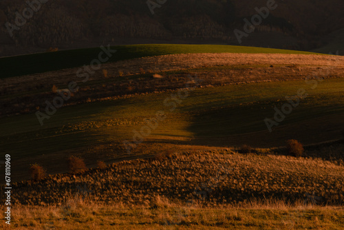 Scenic view of field against sky at autumn sunset in Apuseni Mountains, Romania © landscapeaway