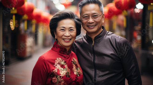 Chinese couple with Chinese traditional clothing, celebrating Chinese new year