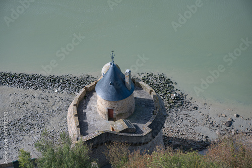 Architectural detail of the Gabriel tower (tour gabriel), former element of protection and defense of Mont Saint Michelle. Top view photo