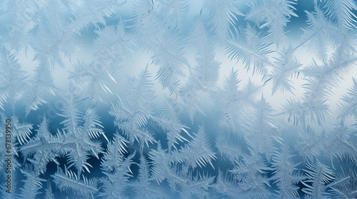 Winter background with frostwork on glass. New Year header for a website with Copy space.