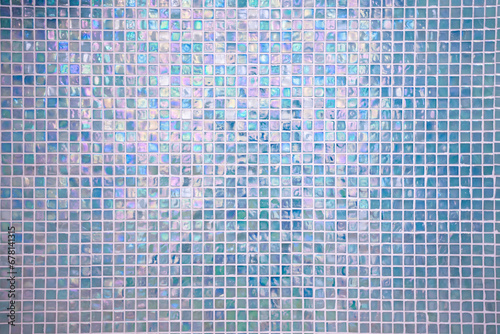 Pastel blue mosaic texture background, decorative tile wall