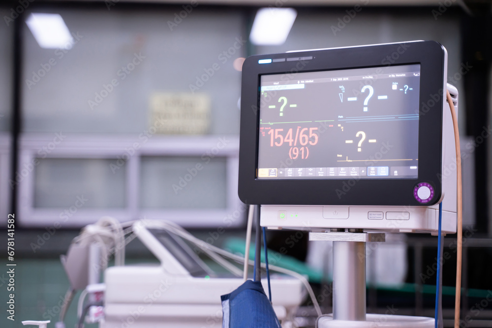 Heart rate monitor, electrocardiogram in hospital CT scan room, medical