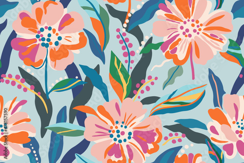 Colorful patterns depicting tropical plants, flowers, flower twigs, leaves on a light blue background. Foliage of exotic plants in summer for banners, prints, decor. photo