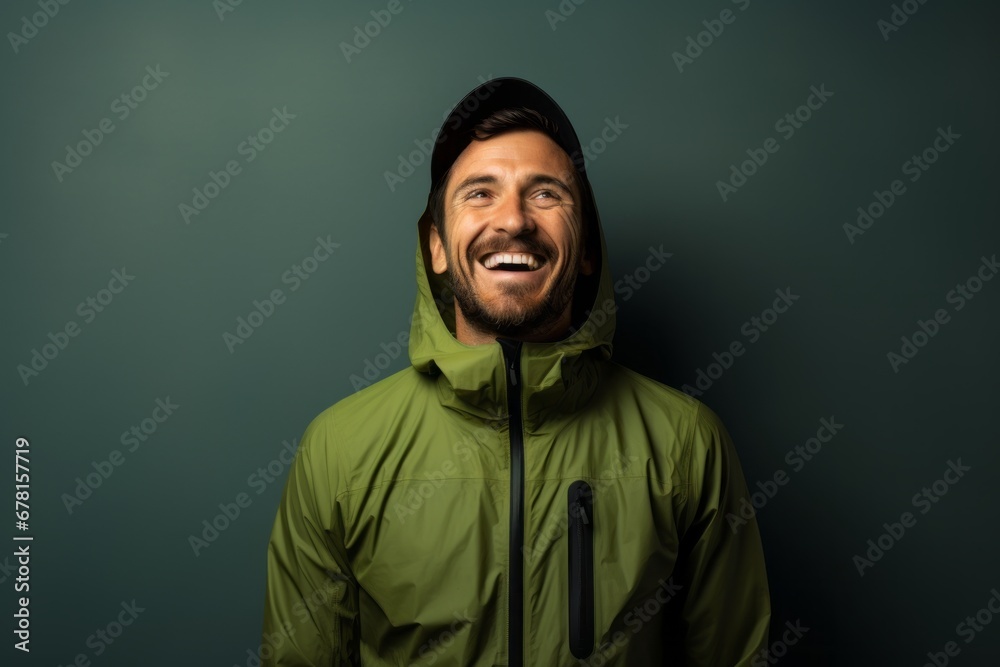 Portrait of a happy man in his 30s wearing a windproof softshell against a modern minimalist interior. AI Generation