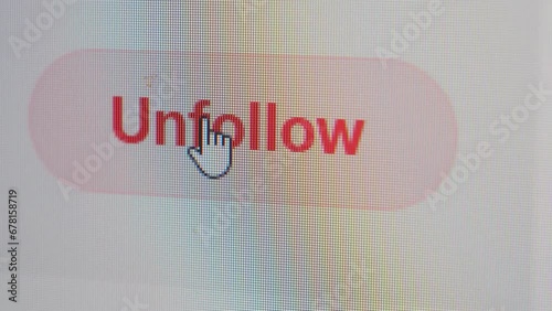 User clicking following button to unfollow an acount on social media