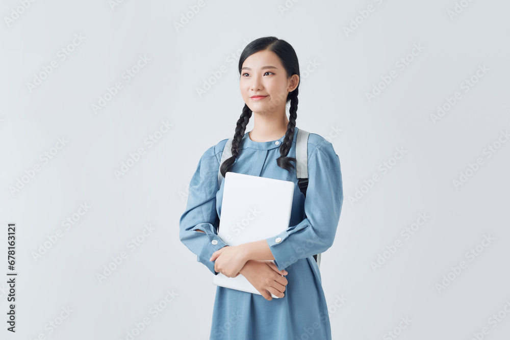 Young student woman isolated on white background Young student woman isolated on white background