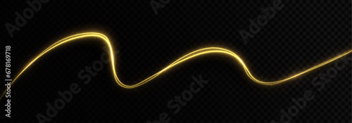 Gold lines on black background. Shiny golden moving line. Magic light trail of glittering comet tail. Glowing glitter sparkles.