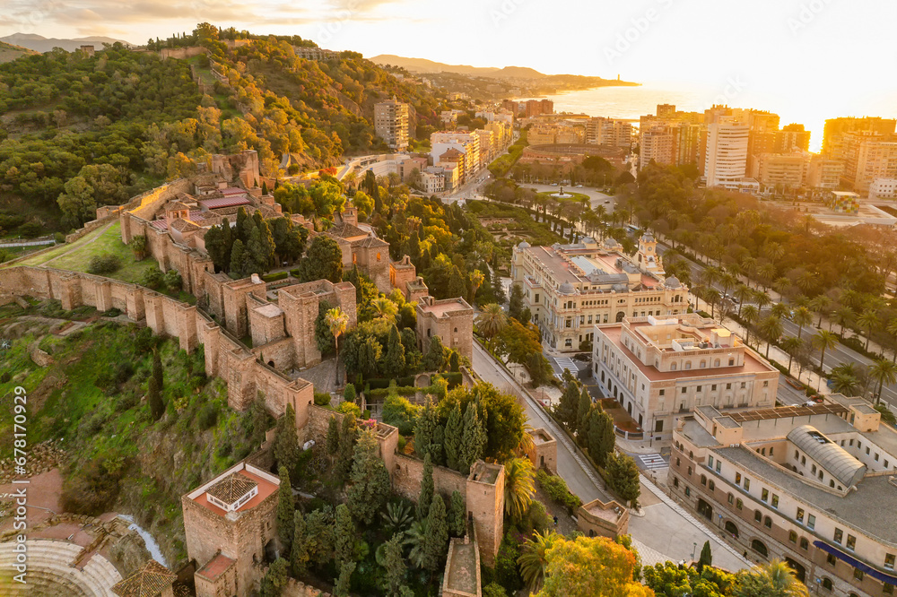 Aerial view of the medieval Moorish castle of Alcazaba at sunrise in Malaga, Spain