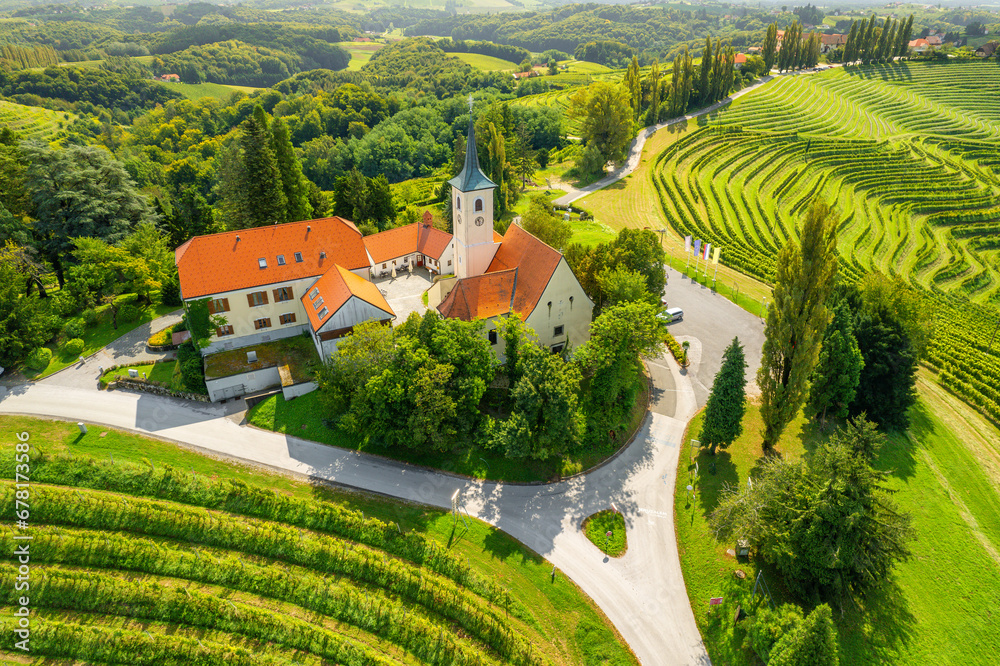 Aerial view of the Church and green vineyards, Jeruzalem winery region, Slovenia