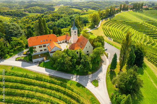 Aerial view of the Church and green vineyards, Jeruzalem winery region, Slovenia photo
