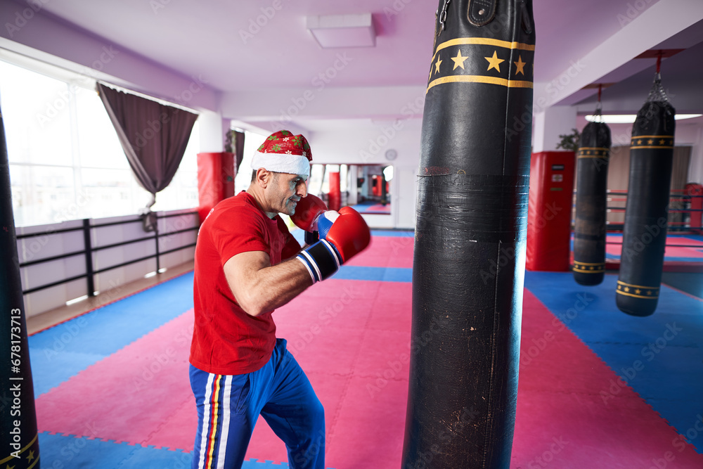 Santa Claus in a boxing gym