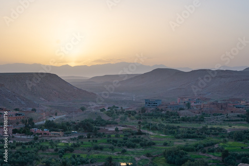 Draa valley in a sunset evening with oasis villages in the Sahara Desert