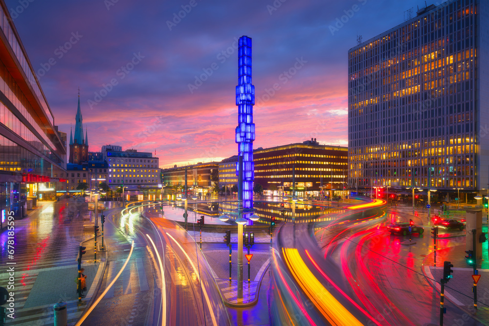 Sergels Square, Stockholm, Sweden. Popular place in the capital of Sweden. Public transport and blurred lights. Architectural landscape. Photo for postcards, wallpaper and backgrounds.