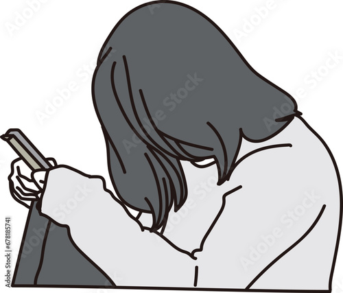 スマートフォンを見て気分が落ち込む女性