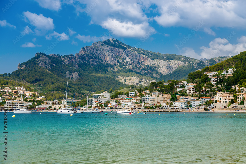 Azure sea with mountains on a background in the small coastal town Port de Soller