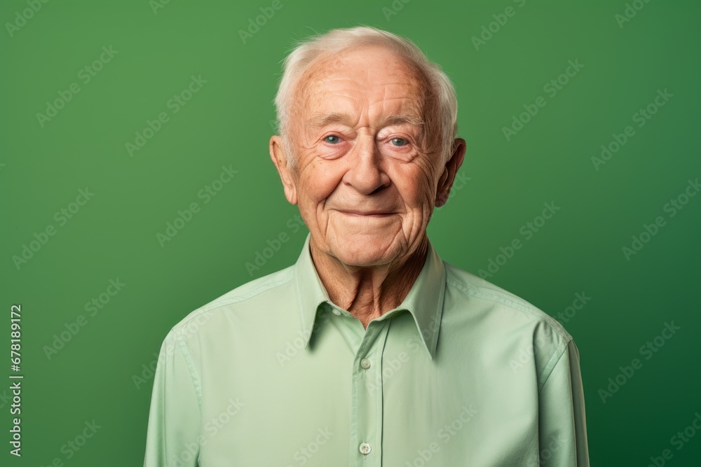 Portrait of a glad man in his 80s wearing a simple cotton shirt against a soft green background. AI Generation Portrait of a glad man in his 80s wearing a simple cotton shirt against a soft green background. AI Generation